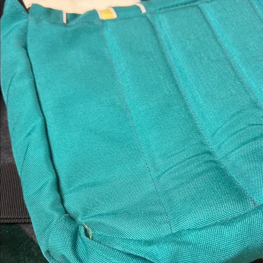 Crumpler Teal Men’s Messenger Bag with Yellow Stripe Accent